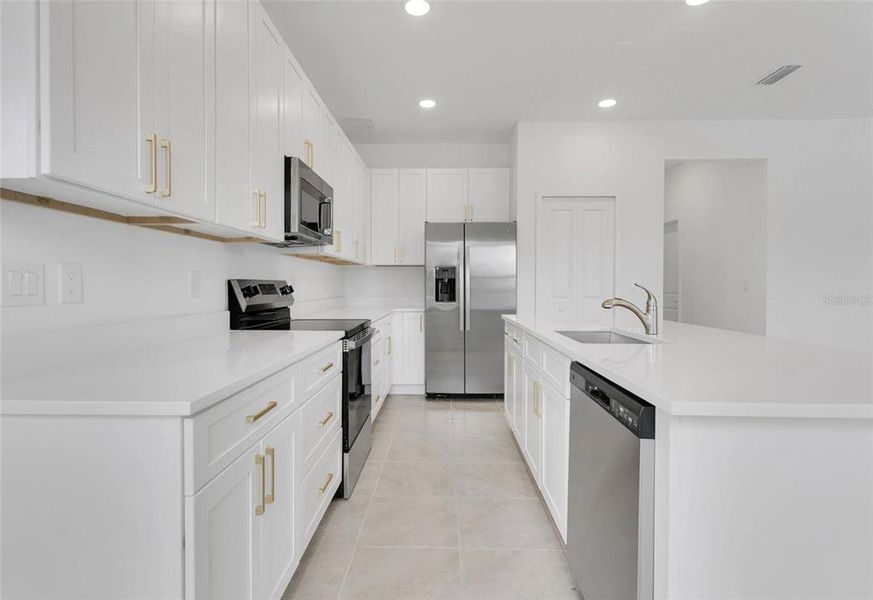 Furnished interior view inside a new home in Yucatan Gardens, Orlando (Image 7).