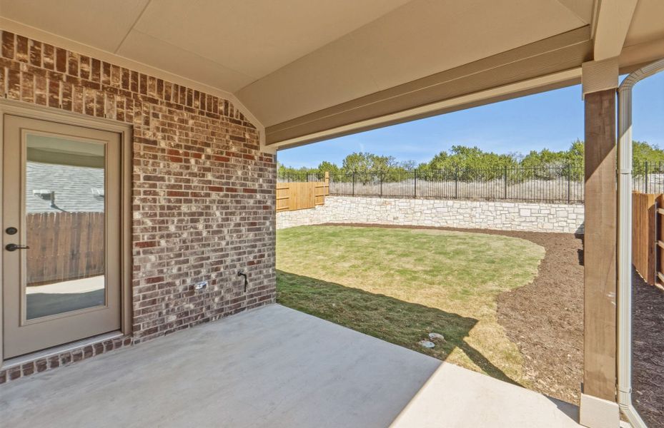 Exterior details and patio area of a home in West Cypress Hills, Spicewood (Image 30). Exterior details and patio area of a home in West Cypress Hills, Spicewood (Image 30).