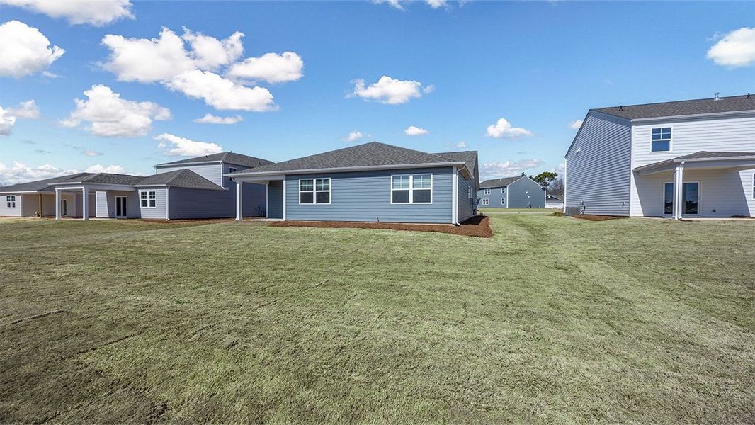 Exterior details and patio area of a home in Sease's Pond, Gilbert (Image 20).