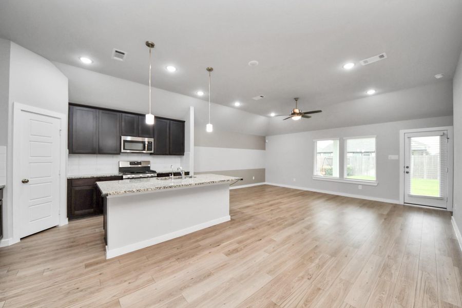 Furnished interior view inside a new home in Marvida, Cypress (Image 5).