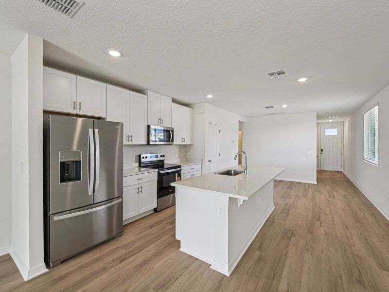 Furnished interior view inside a new home in Leyland Preserve - Premier Series, Brooksville (Image 4).
