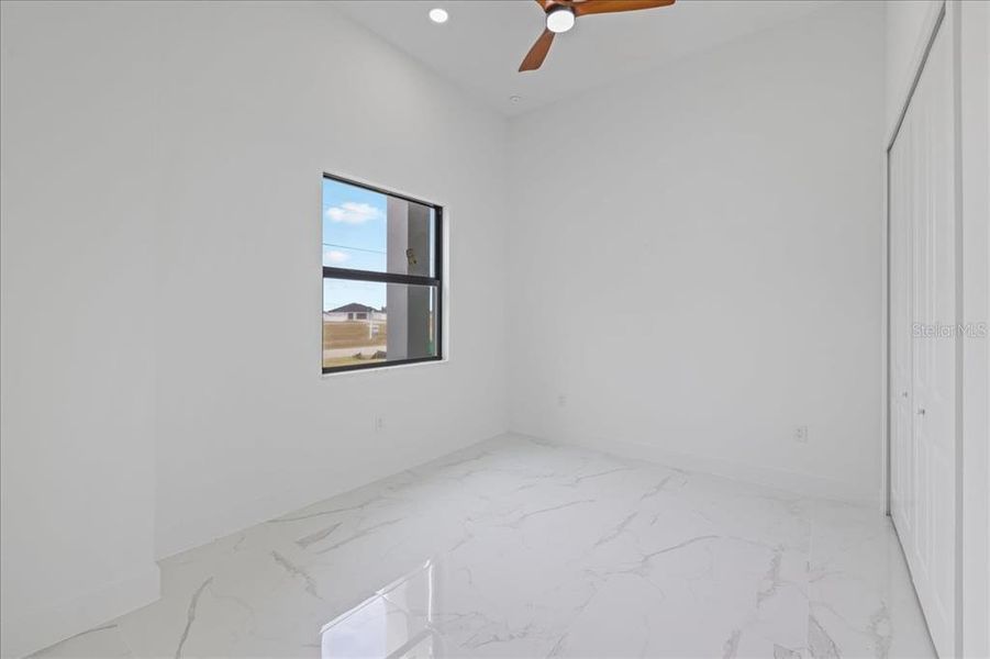 Spacious, unfurnished interior of a new home in , Port Charlotte (Image 24).