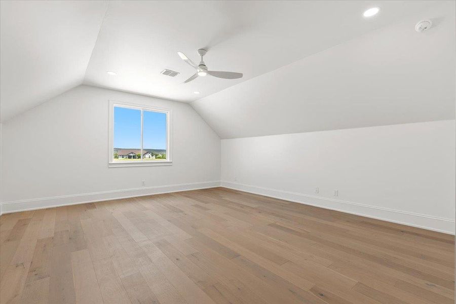 Upstairs is a bonus room, perfect flex space that can be used as a workout room, a bunk room or media room. Not shown in this flex space are a full bathroom and small bar area with mini-fridge. Upstairs is a bonus room, perfect flex space that can be used as a workout room, a bunk room or media room. Not shown in this flex space are a full bathroom and small bar area with mini-fridge.
