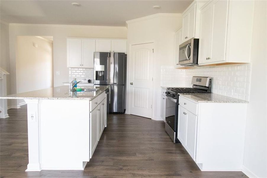 Furnished interior view inside a new home in Braselton Village, Braselton (Image 5). Furnished interior view inside a new home in Braselton Village, Braselton (Image 5).