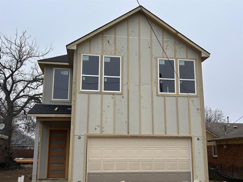 View of front of home with a garage