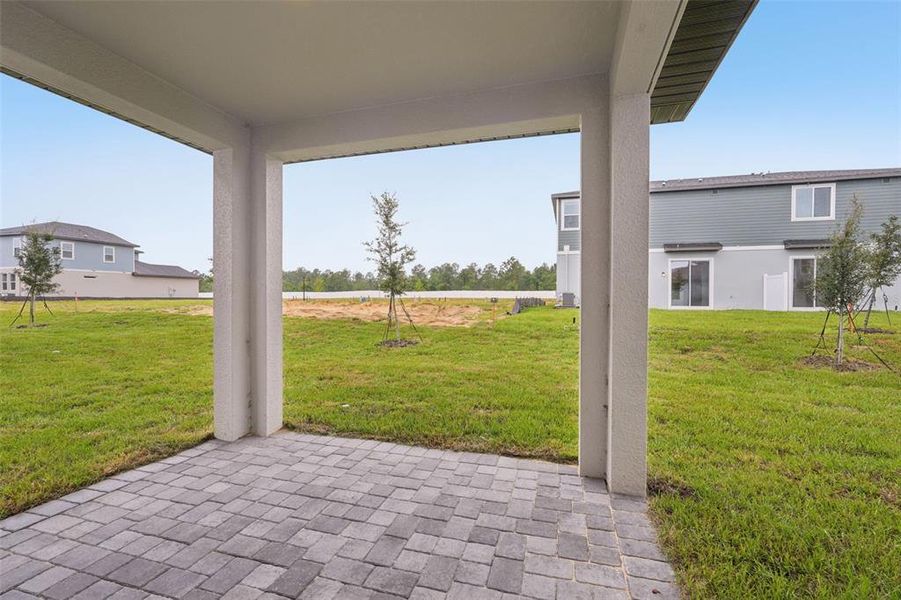 Exterior details and patio area of a home in Cyrene at Minneola, Minneola (Image 3).
