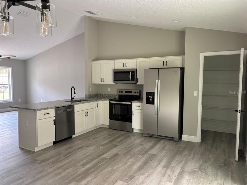 Furnished interior view inside a new home in , Dunnellon (Image 8).