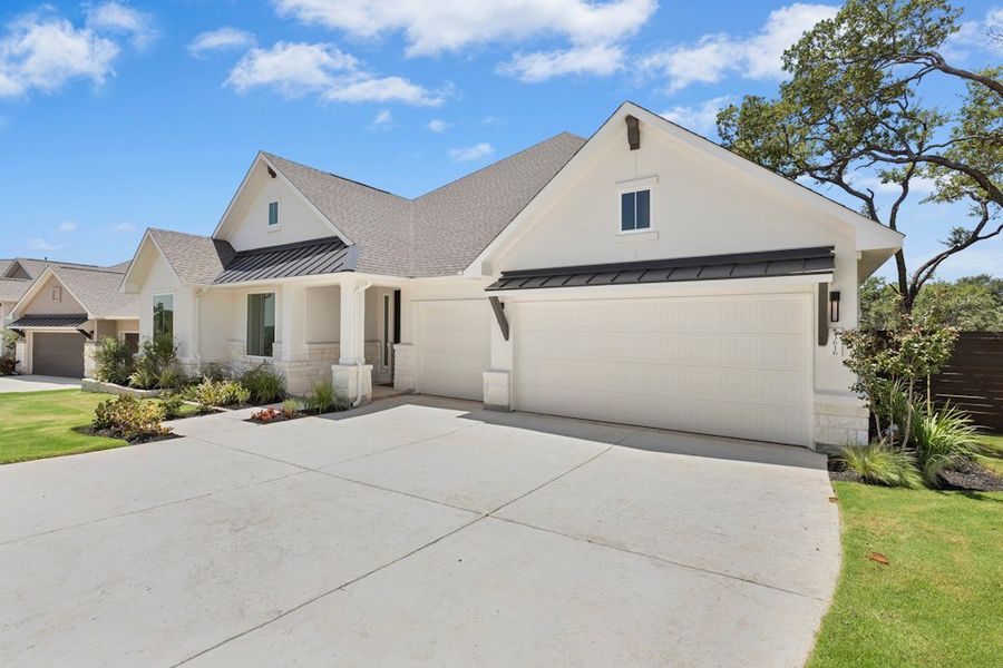 Front exterior of a new home in Riverstone, Georgetown, TX, highlighting curb appeal (Image 19).