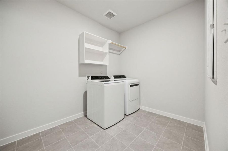 Utility Room in the Heisman home plan by Trophy Signature Homes – REPRESENTATIVE PHOTO