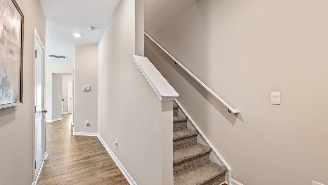 Spacious, unfurnished interior of a new home in Tanglewood Townes, Greenville (Image 21).