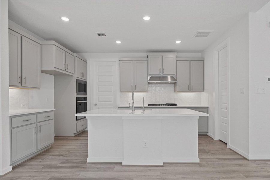 Furnished interior view inside a new home in University Heights, Round Rock (Image 7).