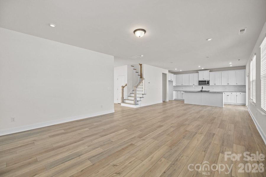 Family Room Looking Into KitchenPhotos are representative and may not reflect the exact home, finishes, or features.