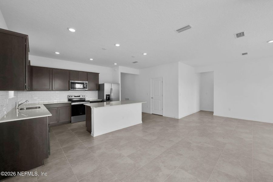 Furnished interior view inside a new home in Hyland Trail, Green Cove Springs (Image 8).