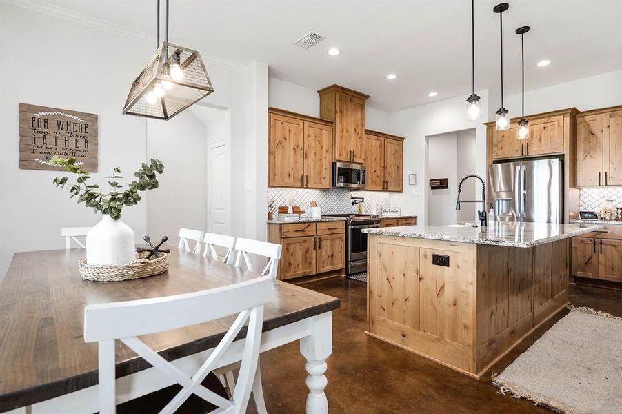 Huge dining area and those kitchen cabinets!