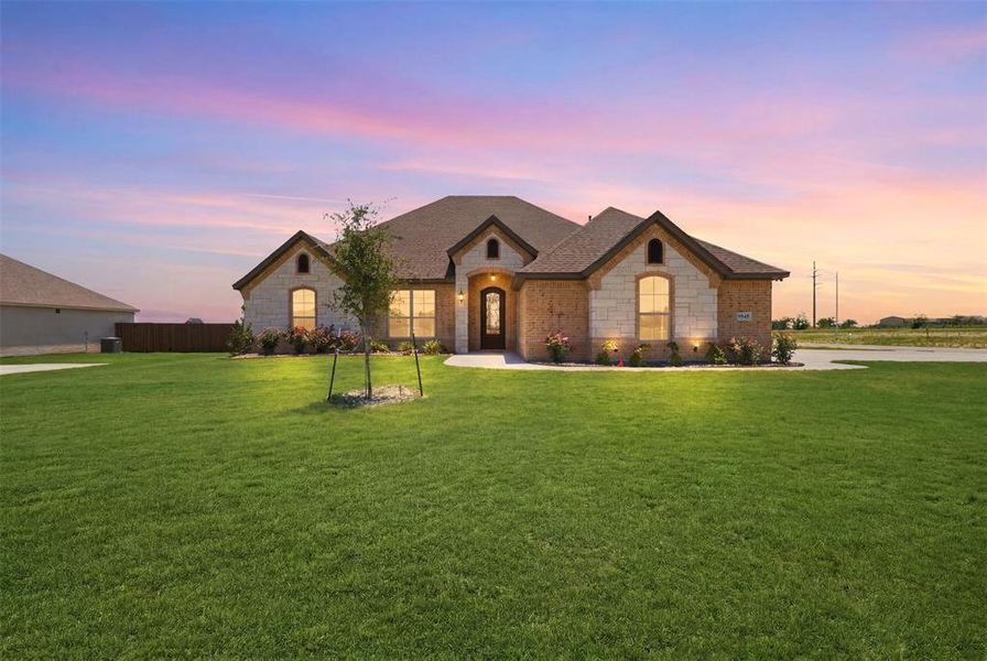 Front exterior of a new home in , Godley, TX, highlighting curb appeal (Image 25).