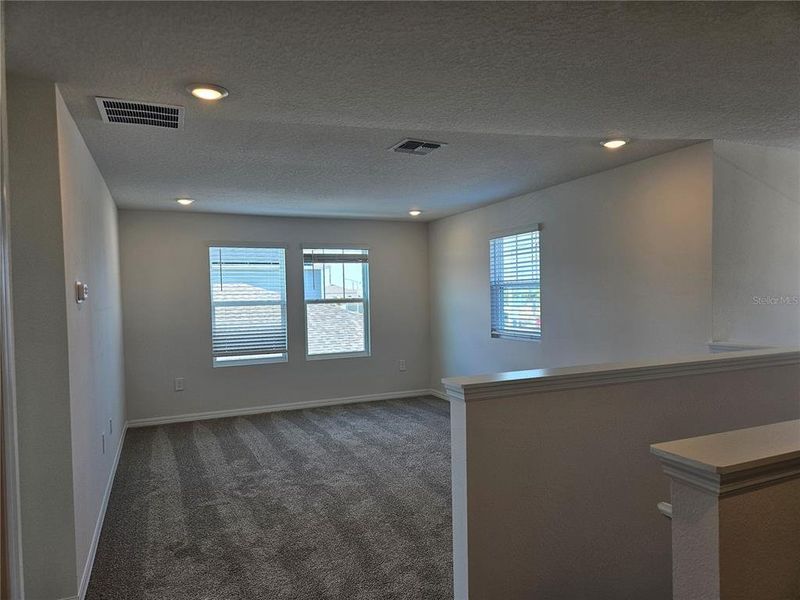 Spacious, unfurnished interior of a new home in Lawson Dunes - Signature Series, Haines City (Image 24).