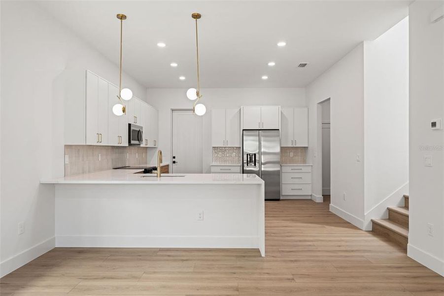 Furnished interior view inside a new home in , Tampa (Image 9).
