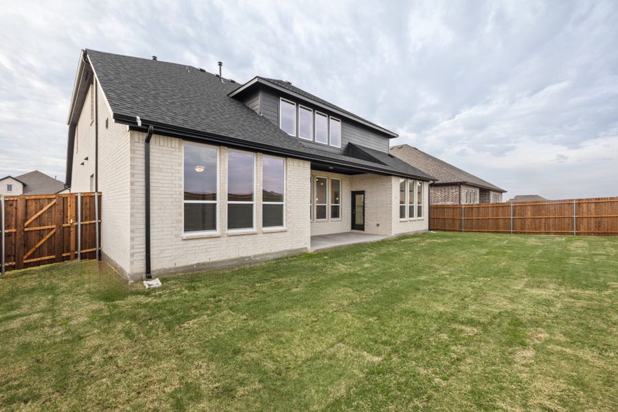 Exterior details and patio area of a home in Lake Breeze, Lavon (Image 28). Exterior details and patio area of a home in Lake Breeze, Lavon (Image 28).