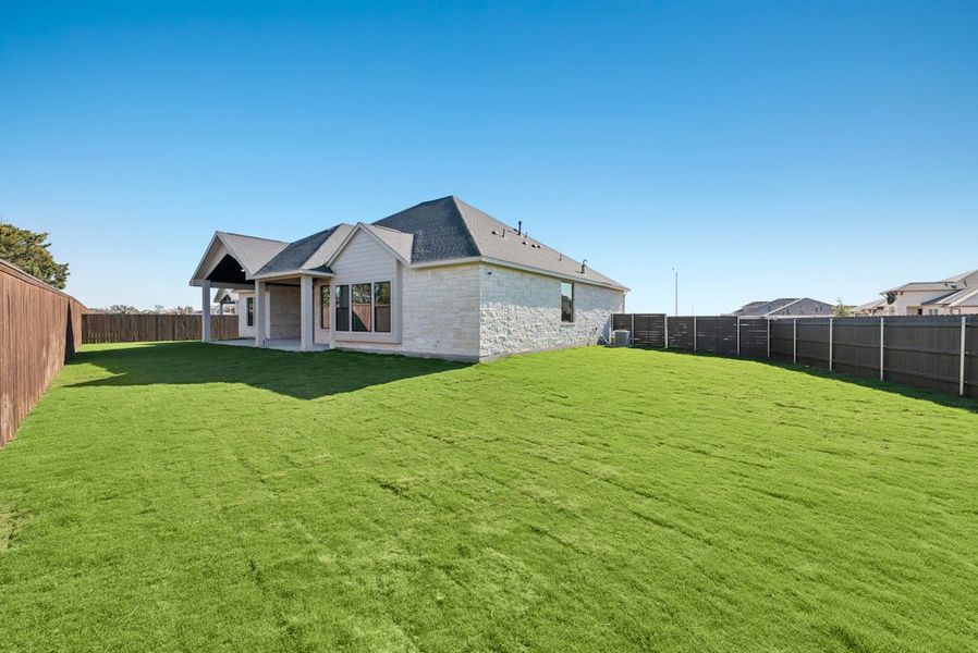 Exterior details and patio area of a home in Riverstone, Georgetown (Image 28).