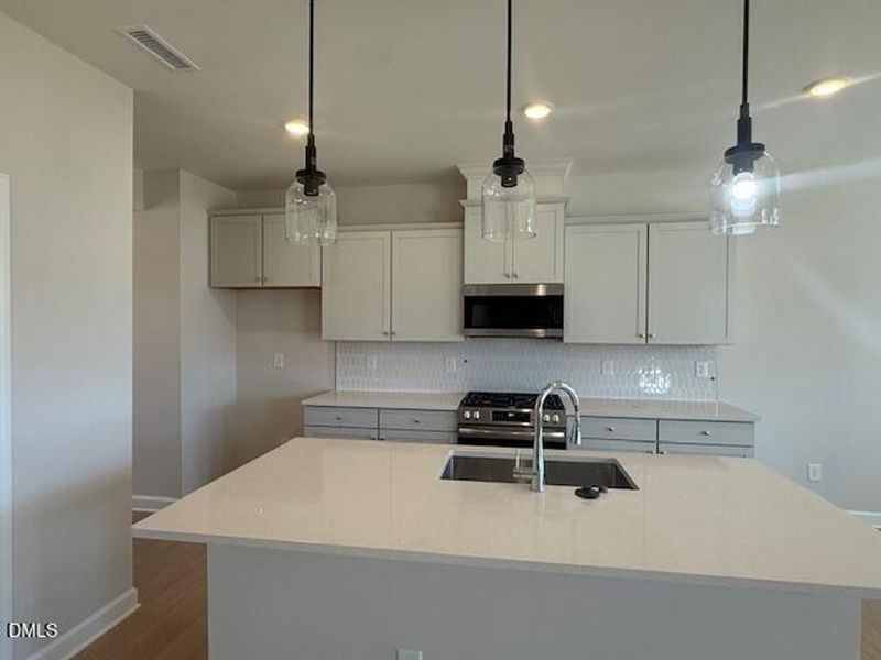 Furnished interior view inside a new home in Woodland Crossing, Zebulon (Image 5).