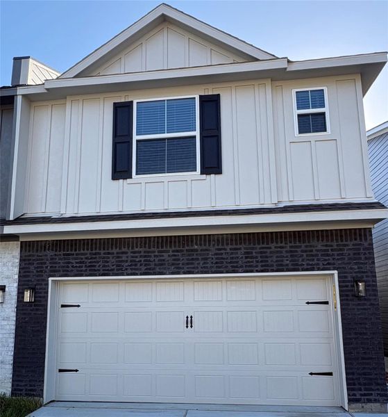 Front exterior of a new home in , Conroe, TX, highlighting curb appeal (Image 1). Front exterior of a new home in , Conroe, TX, highlighting curb appeal (Image 1).