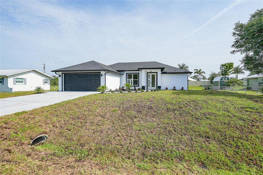 Front exterior of a new home in , Arcadia, FL, highlighting curb appeal (Image 26).