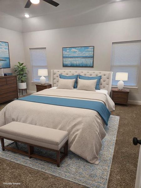 Bedroom featuring ceiling fan and carpet floors