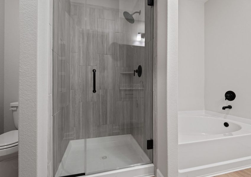 Step-in shower with tile detail Step-in shower with tile detail