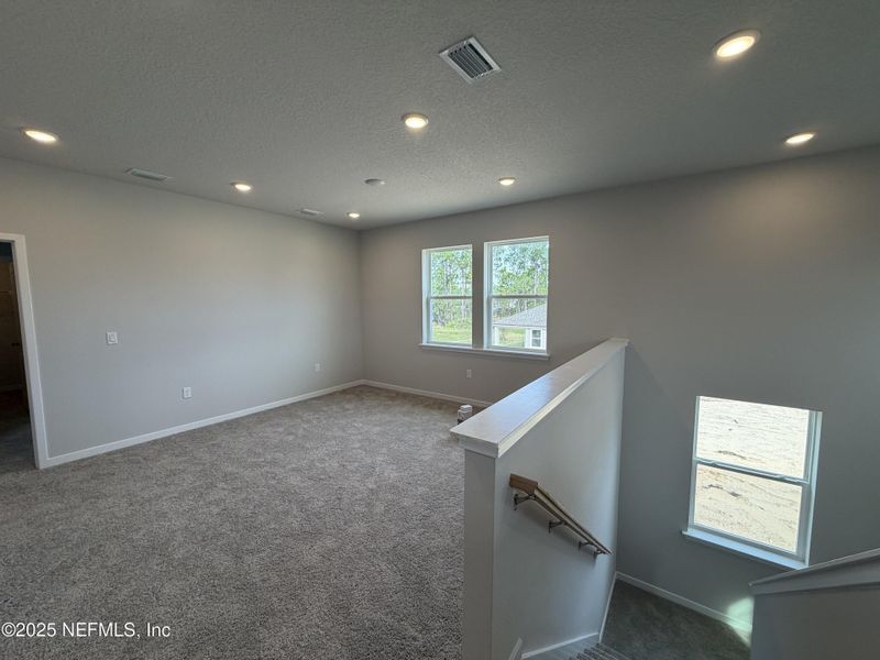 Spacious, unfurnished interior of a new home in , Flagler Beach (Image 38).