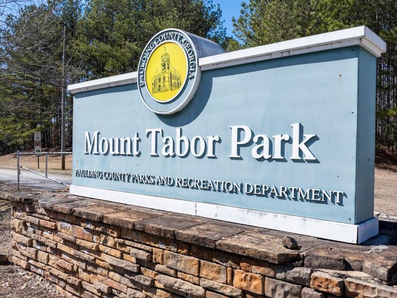 Front exterior of a new home in Hamptons at Riverwood East, Dallas, GA, highlighting curb appeal (Image 25).