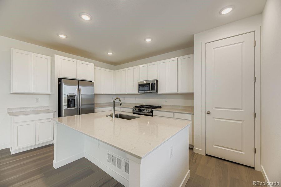 Furnished interior view inside a new home in Ken-Caryl Ranch: The Monarch Collection, Littleton (Image 8).