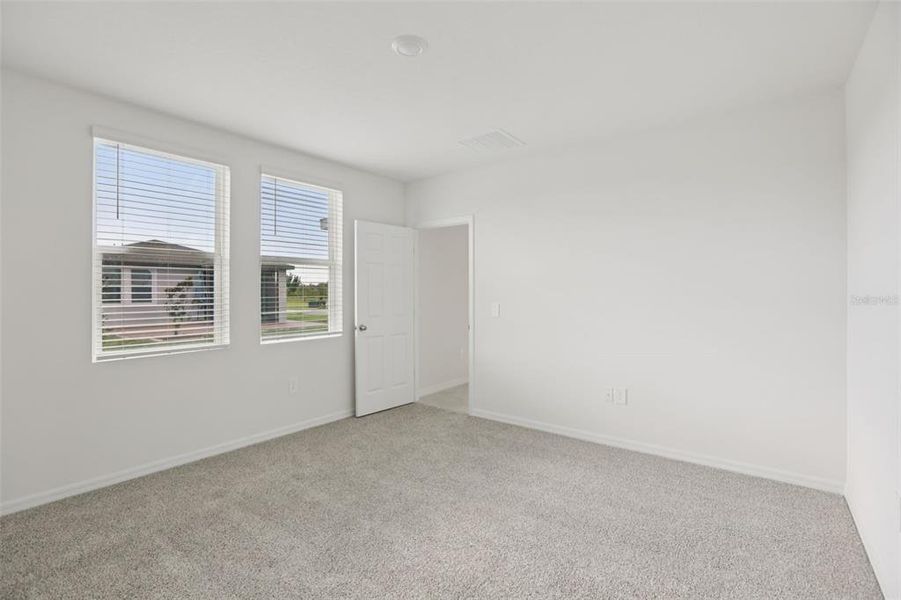 Spacious, unfurnished interior of a new home in Springs at Lake Alfred - Classic Series, Lake Alfred (Image 29).