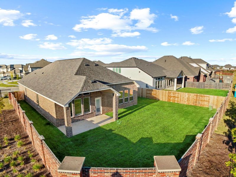 Enjoy this spacious, beautifully maintained backyard—fully fenced and perfect for outdoor fun, gardening, pets, or weekend gatherings. The covered patio offers a great spot for grilling or relaxing while taking in the open green space.