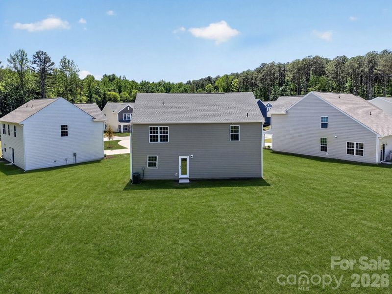 Exterior details and patio area of a home in Creekside Cottages, Bessemer City (Image 19).