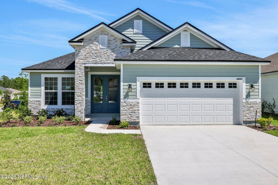 Front exterior of a new home in Hyland Trail, Green Cove Springs, FL, highlighting curb appeal (Image 24).