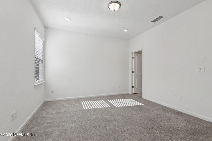 Spacious, unfurnished interior of a new home in Brandon Lakes at Silver Landing, St. Augustine (Image 21).