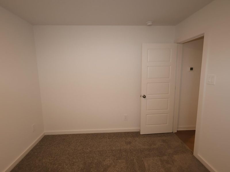 Spacious, unfurnished interior of a new home in Pinewood at Grand Texas, New Caney (Image 5).