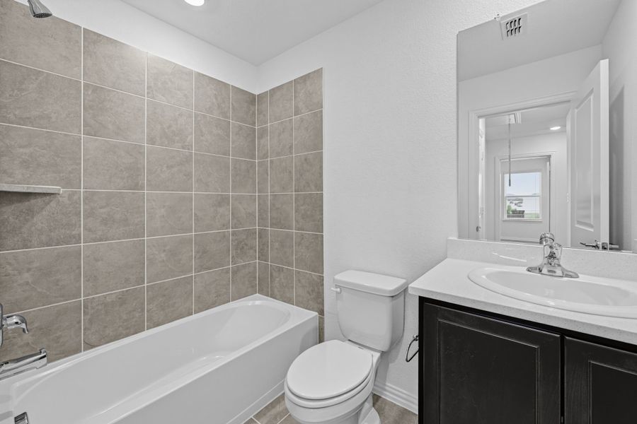 Furnished interior view inside a new home in Parks at Foster Crossing, Anna (Image 11).