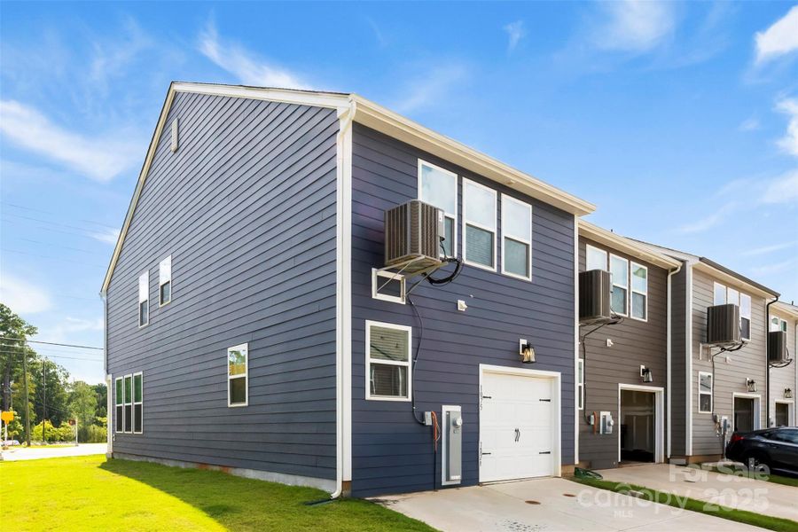 Front exterior of a new home in , Belmont, NC, highlighting curb appeal (Image 20).