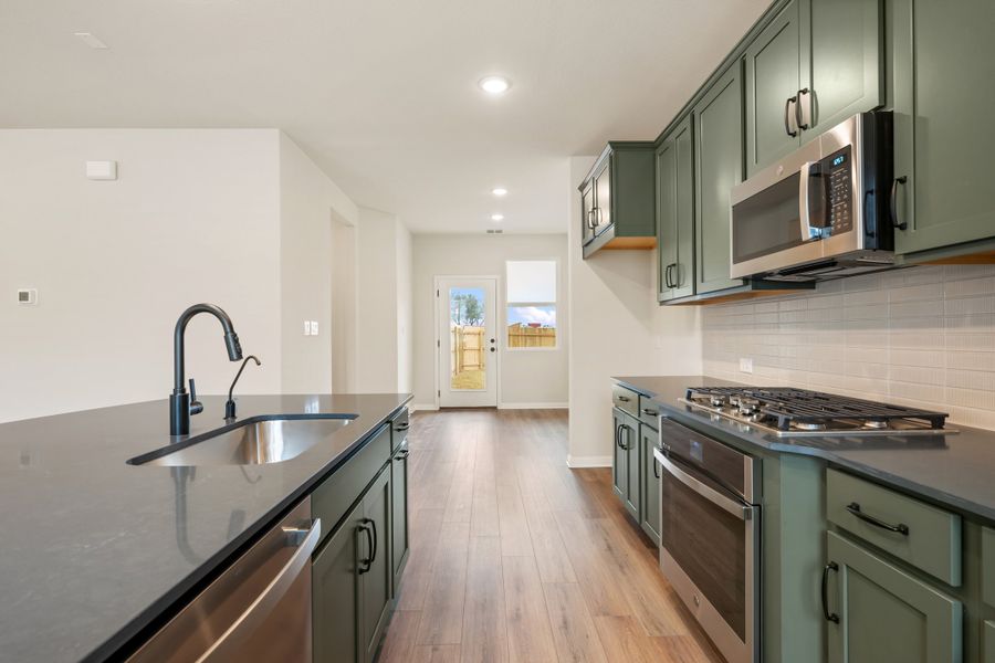 Representative furnished interior of a home built from the Robin by Ashton Woods in The Cottages at Lariat, Liberty Hill (Image 11). Representative furnished interior of a home built from the Robin by Ashton Woods in The Cottages at Lariat, Liberty Hill (Image 11).