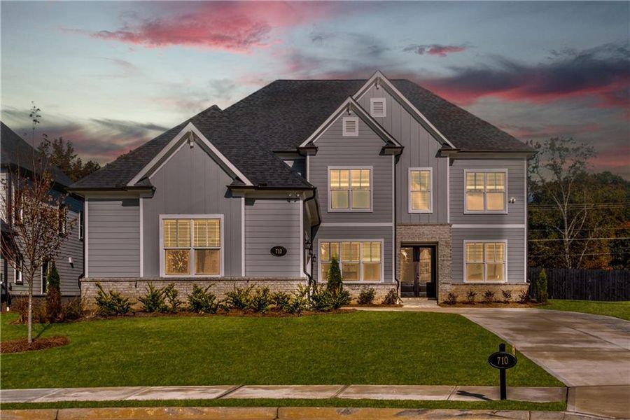 Front exterior of a new home in The Retreat at Caney Creek, Alpharetta, GA, highlighting curb appeal (Image 27).