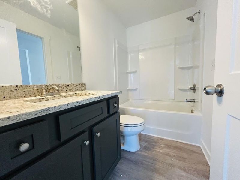 Furnished interior view inside a new home in Sutton's Landing, Statham (Image 8).