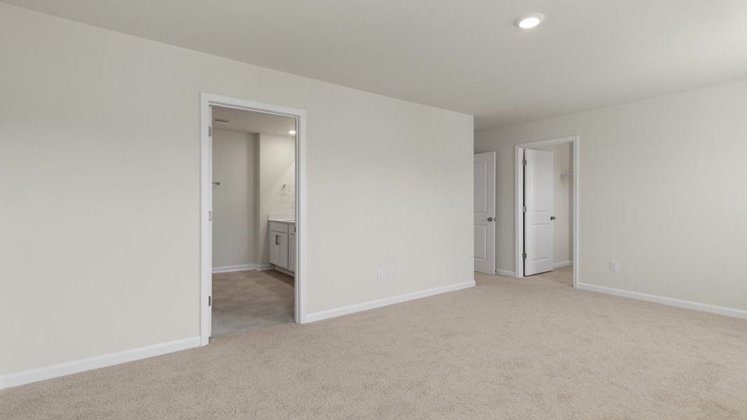 Spacious, unfurnished interior of a new home in The Grove at Matthews Landing, Fuquay Varina (Image 17).