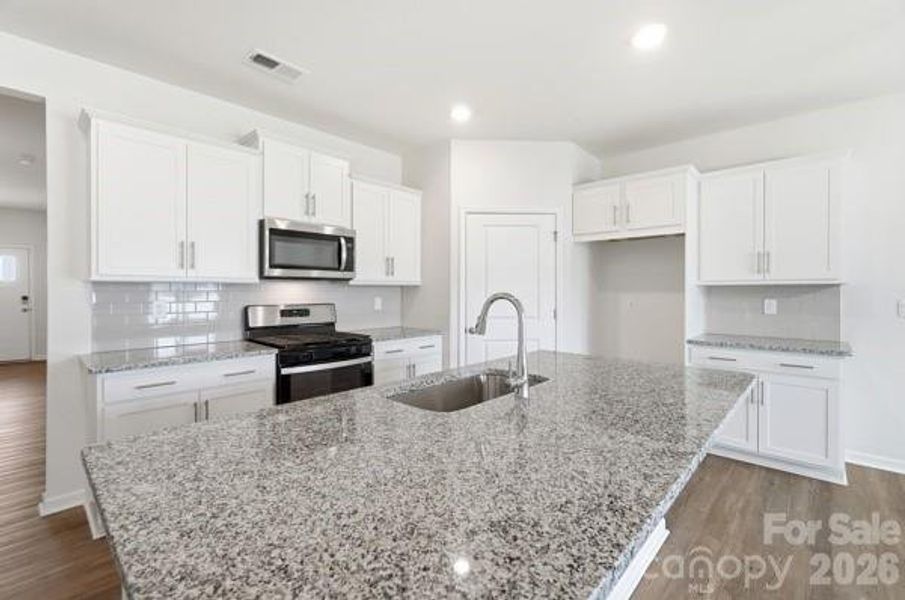 Furnished interior view inside a new home in Secrest Commons, Monroe (Image 6).