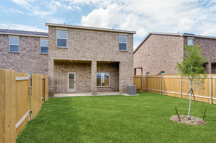This is an example of the backyard at 736 Carson Lane. All backyards are fenced, landscaped, and have a concrete covered patio. This is an example of the backyard at 736 Carson Lane. All backyards are fenced, landscaped, and have a concrete covered patio.