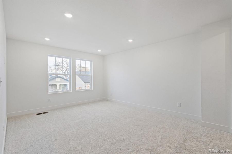 Spacious, unfurnished interior of a new home in Windsong, Thornton (Image 30).