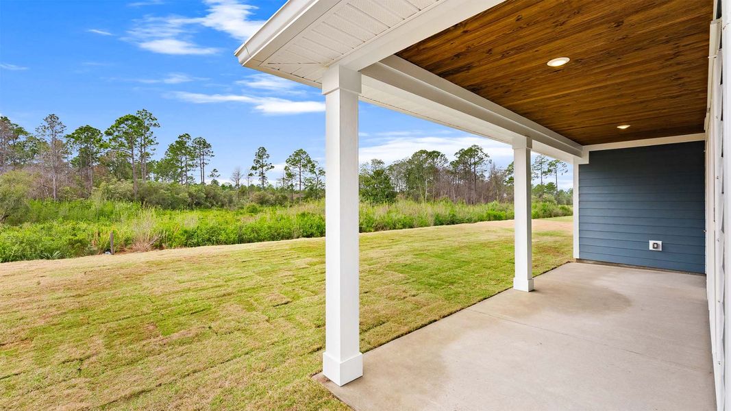 Exterior details and patio area of a home in Breakfast Point East Phase II, Panama City Beach (Image 4).