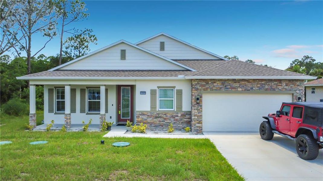 Front exterior of a new home in Palm Bay, Palm Bay, FL, highlighting curb appeal (Image 27).