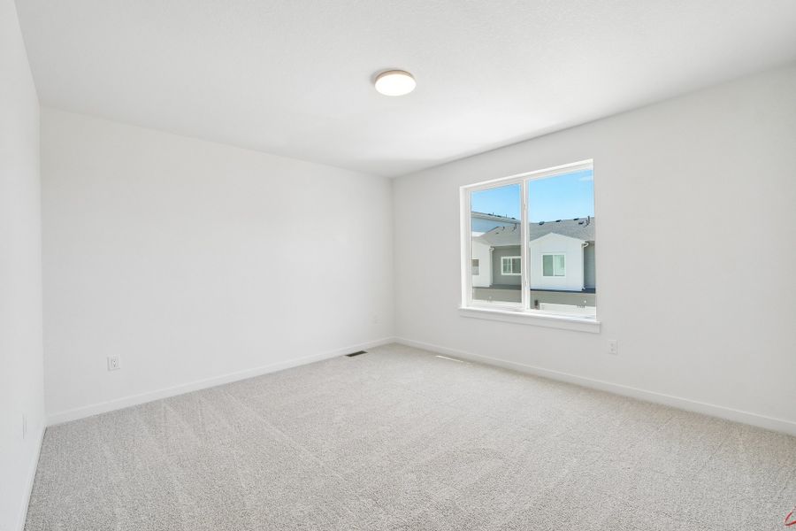 Spacious, unfurnished interior of a new home in The Vistas at West Mesa, Colorado Springs (Image 25).