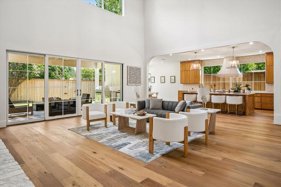 Living to patio view, two-story ceiling, open kitchen sight line Living to patio view, two-story ceiling, open kitchen sight line